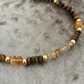 Collar cuarzo rutilado, topacio imperial, ojo de tigre y ébano
