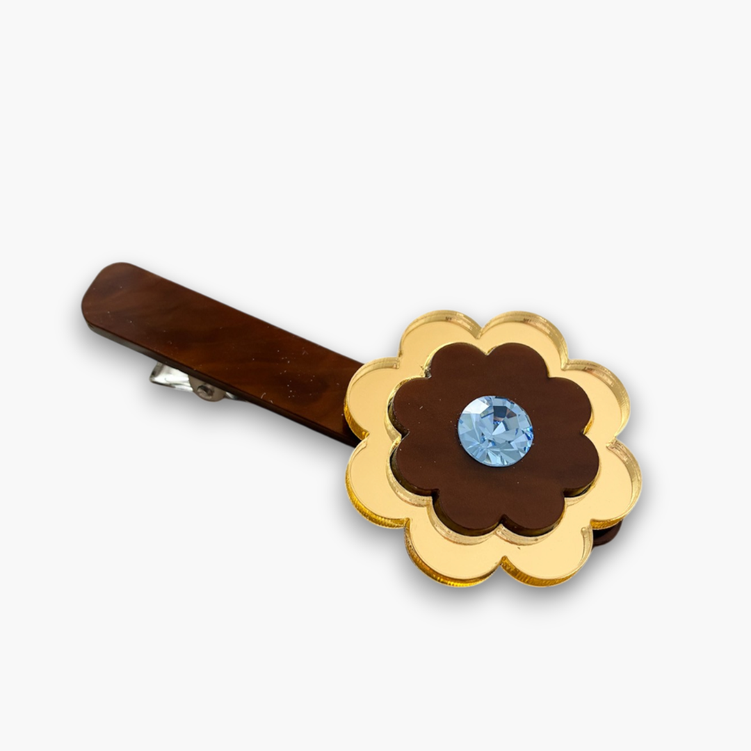 Pinza marrón con flor cristal zafiro claro